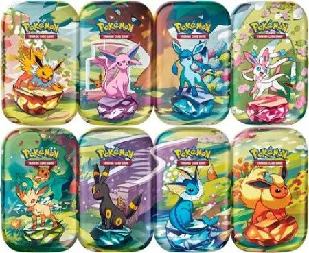 Pokémon Prismatic Evolutions Tin - 1 Random Tin Art sealed